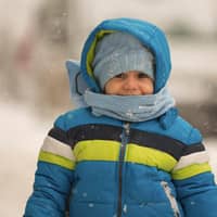 Learn How You Can Help The Coats For Kids Program In Cleveland young child from cleveland with new winter coat