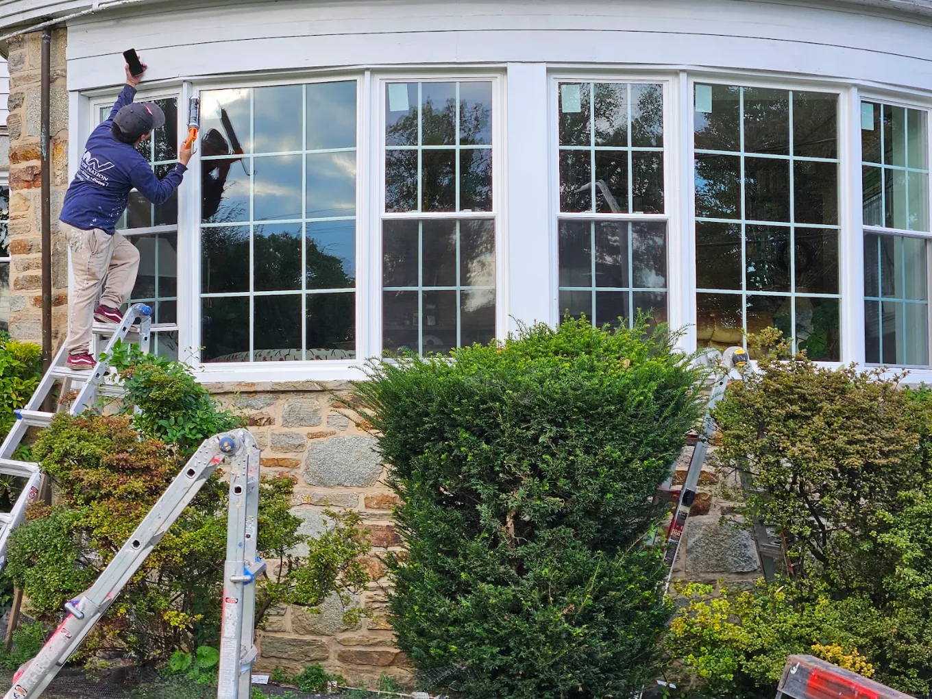 Residential home in Baltimore featuring new vinyl replacement windows.