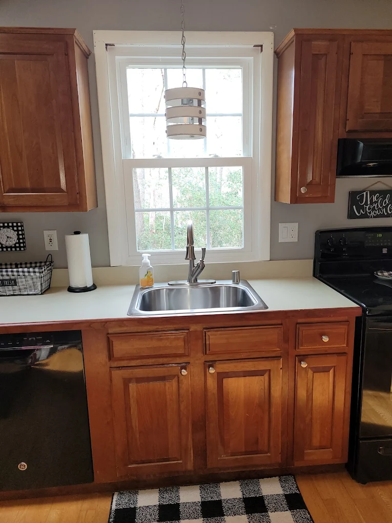 New replacement kitchen windows bringing natural light into a Baltimore home.