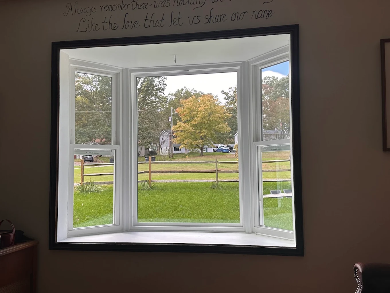 Residential home in Baltimore featuring new vinyl replacement Picture window