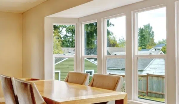 White vinyl double hung windows in a dining room