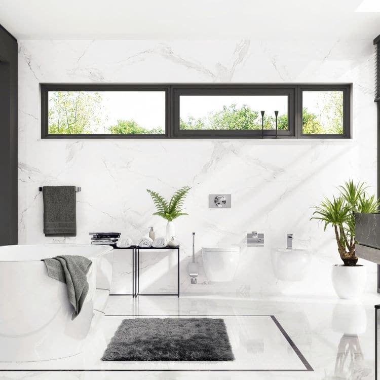 Bathroom with contrast white tile and black window frames