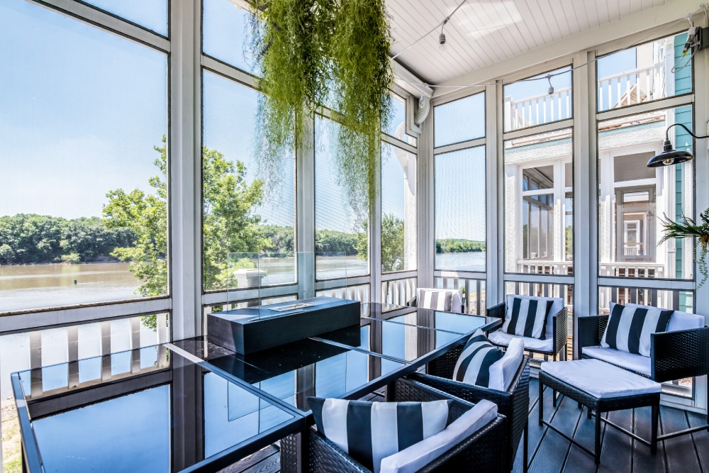 Sunroom in a house overlooking a lake