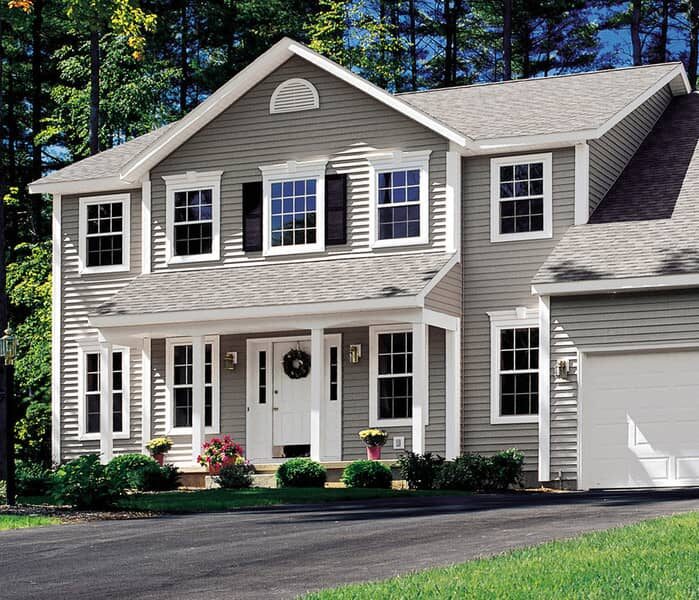 Beautiful home with features windows, doors, and siding